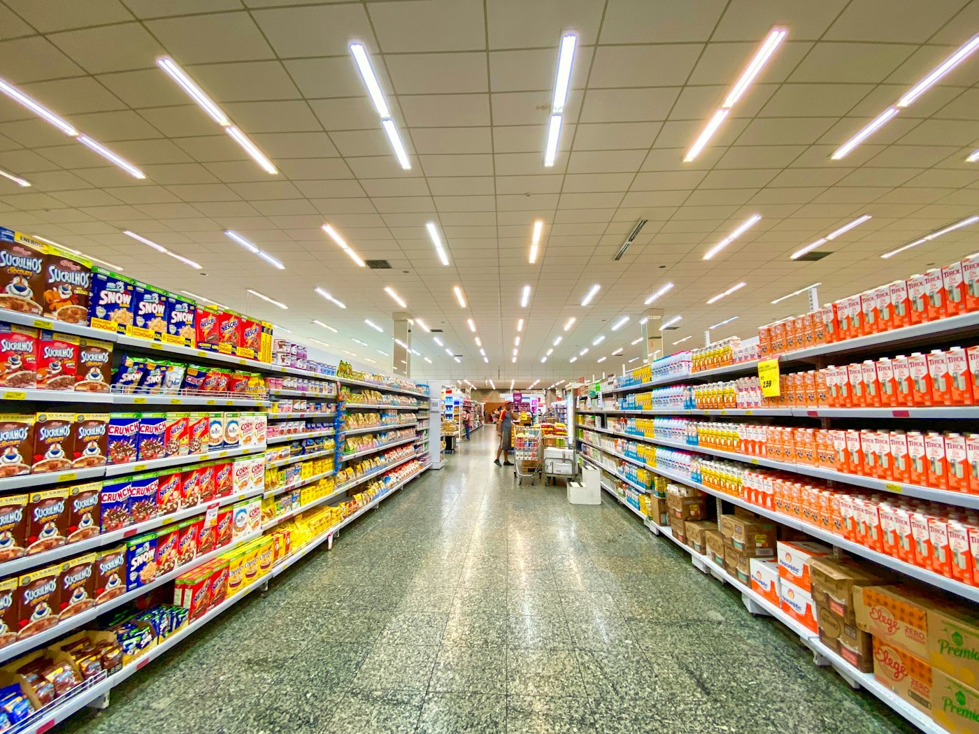 Bright, fully stocked aisles inside the store